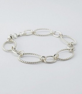 PULSERA DE PLATA CON CIRCULOS Y OVALOS SOLDADOS, CIERRE MOSQUETON LARGO 19CM.